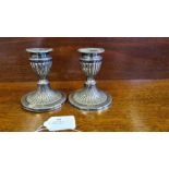 A pair of James Dixon & Son silver fluted stub candlestick, Sheffield 1904.