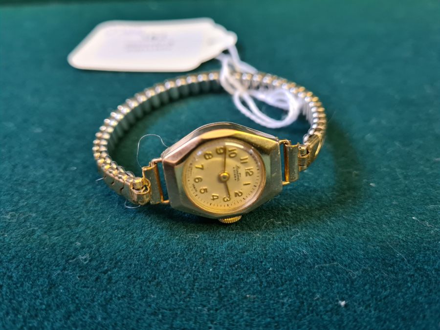 1950's Bentima Star 9ct gold cased wristwatch with gilt metal expanding bracelet.