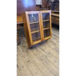 Victorian satin birch glazed 2 door wall hanging cabinet.