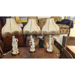 3 large figural table lamps of fashionable young ladies with matching gypsy shades.