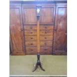 Mahogany inlaid standard lamp on tripod base with feathered carved column base.