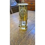 An Eccles type 6 brass miners lamp.