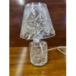 A cut glass table lamp and shade, minor chipping to shade.