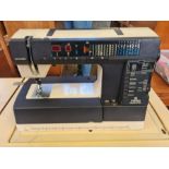 Viking Husqvarna 960 sewing machine in a Horn Collection cabinet complete with foot pedal and