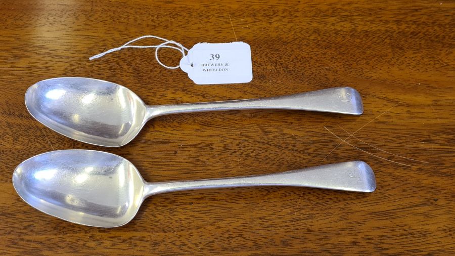 A pair of London silver spoons by Josiah Williams 1922, 148g.