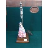 1950's crinoline lady table lamp on mahogany base with bakelite switch.