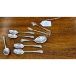 A set of 5 bright cut and chased jam spoons with matching sugar nips by John Round, Sheffield,
