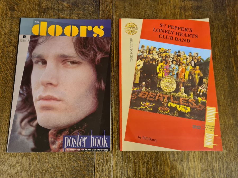 1991 Atlanta Press Doors poster book and a 1987 Atlanta Press Sgt. Pepper photo book (top edge