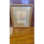 Gilt framed watercolour of fishing boats on rough seas.