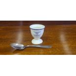 A WWII Luftwaffe egg cup and stainless steel spoon.