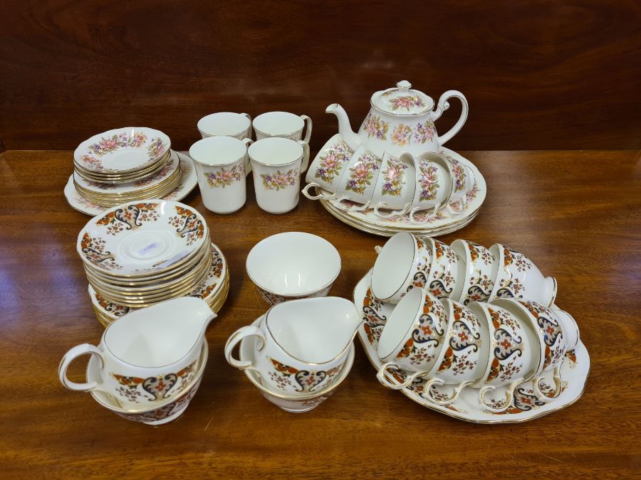 Colclough floral part tea service with teapot, 4 matching coffee cups and a brown and blue Colclough