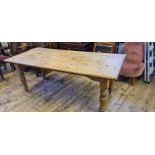 Large Victorian plank top stripped pine kitchen table upon thick turned legs 197cm x 88cm x 74cm