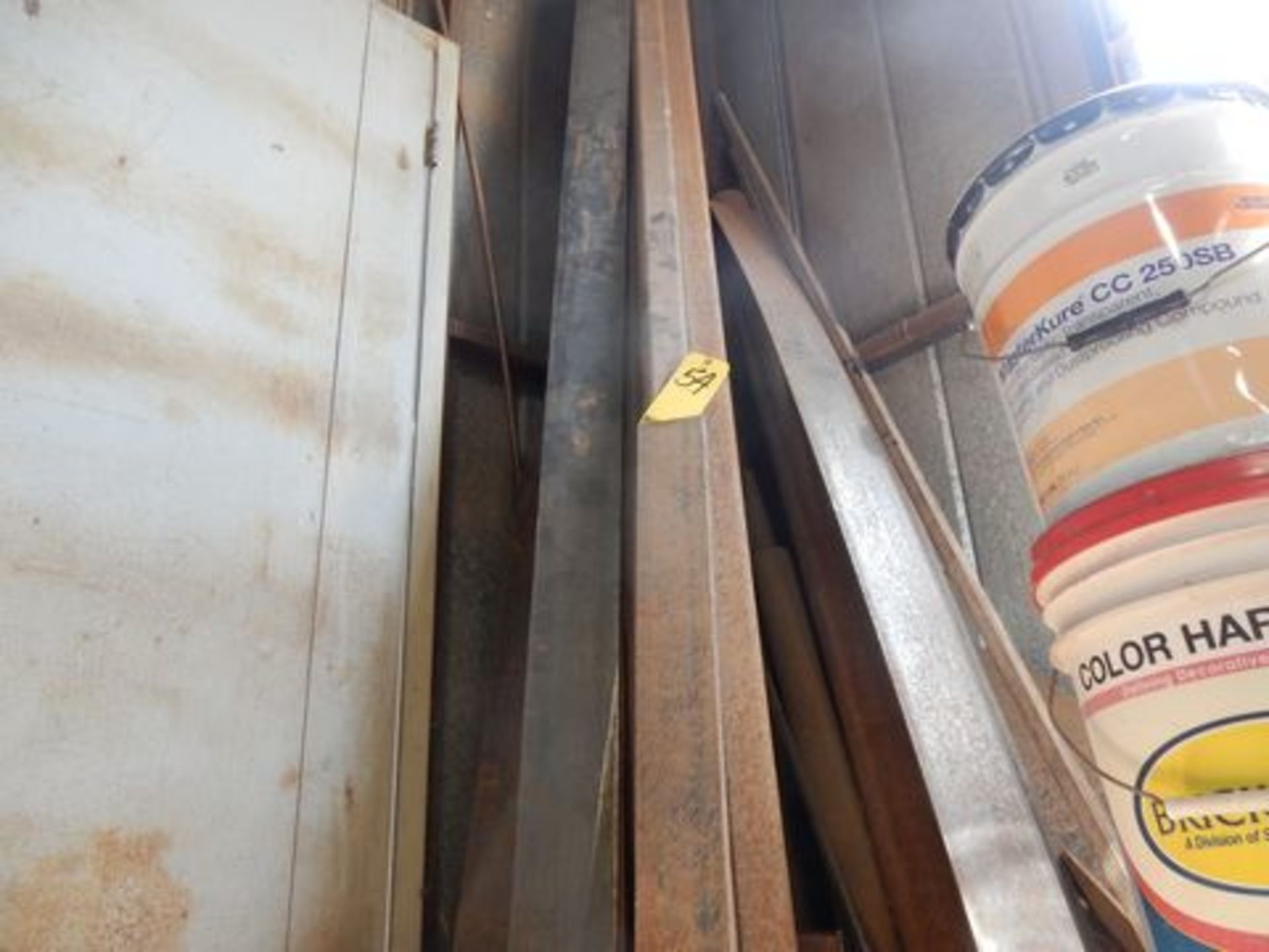 LOT ITEMS IN CORNER TO INCLUDE: MISC. STEEL TUBING, FLAT BAR, ETC.