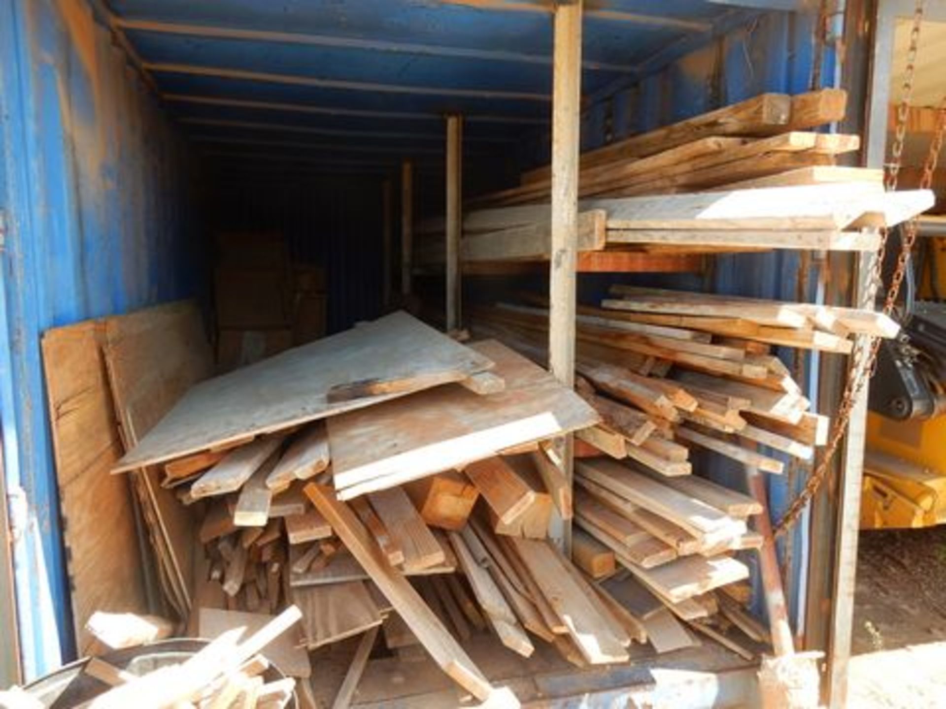 LOT CONTENTS OF CONTAINER TO INCLUDE - PLYWOOD SHEETS, 2 X 4 & 2 X 6 LUMBER, ETC.