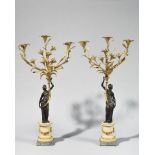 Paire de CANDELABRES à trois lumières en bronze ciselé, doré et patiné, le fût en forme de femme