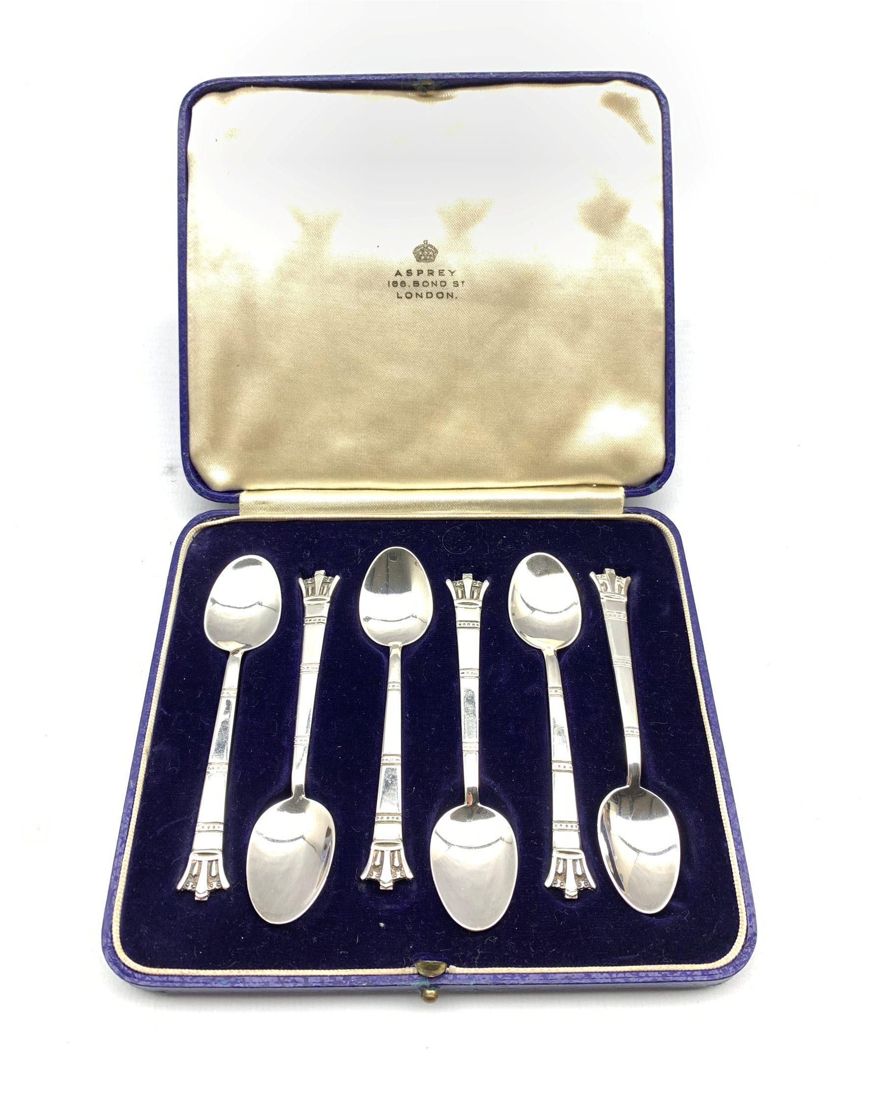 Set of six silver coffee spoons with coronet terminals and hammered detail to the underside of the b