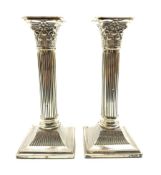 Pair of late Victorian silver Corinthian column table candlesticks with square bases H20cm Birmingha