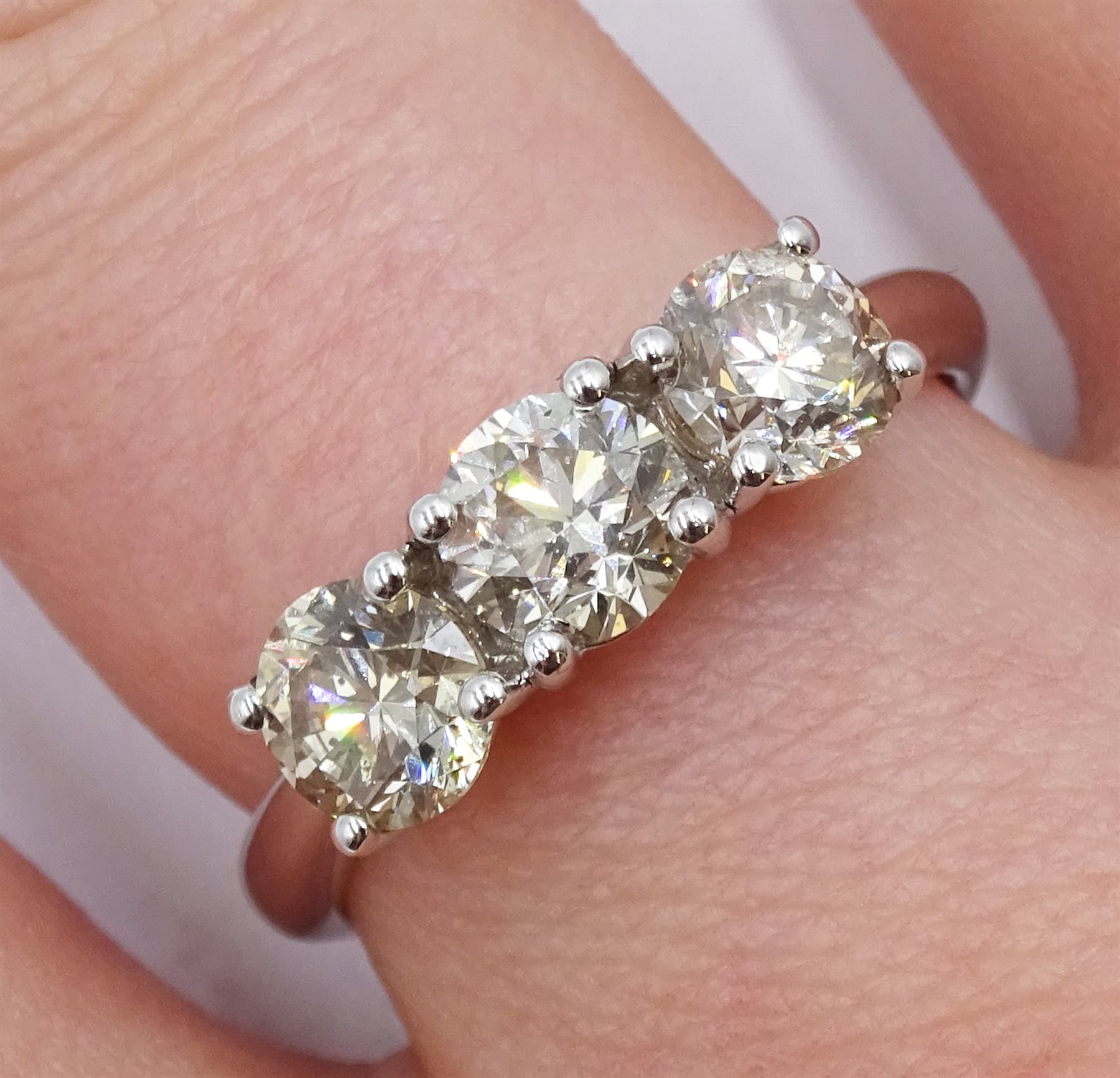 18ct white gold round brilliant cut three stone diamond ring, hallmarked, total diamond weight appro - Image 2 of 4