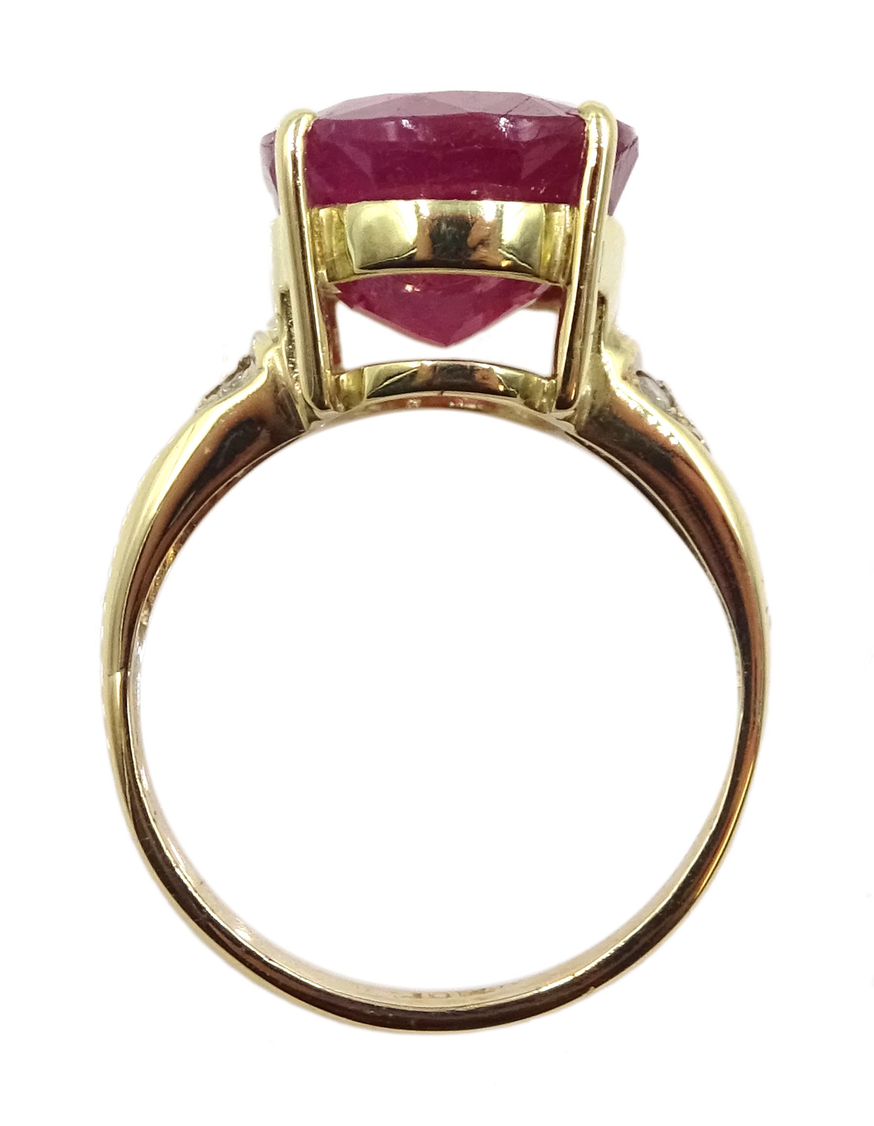 Gold single stone oval ruby ring, with diamond set shoulders stamped 18ct, ruby approx 7.00 carat - Image 4 of 5