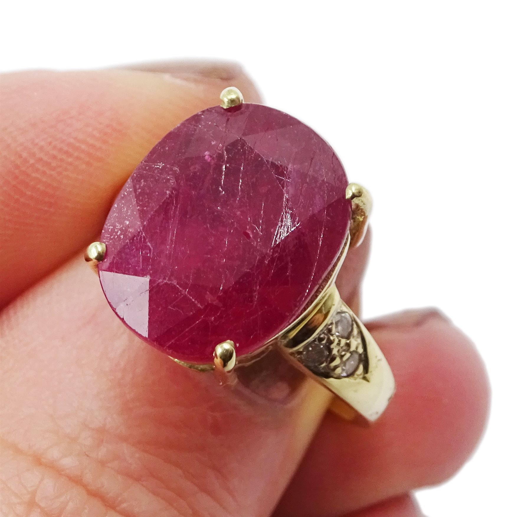 Gold single stone oval ruby ring, with diamond set shoulders stamped 18ct, ruby approx 7.00 carat - Image 5 of 5