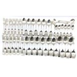 Suite of Old English pattern silver cutlery comprising eleven table forks, eleven table spoons, six
