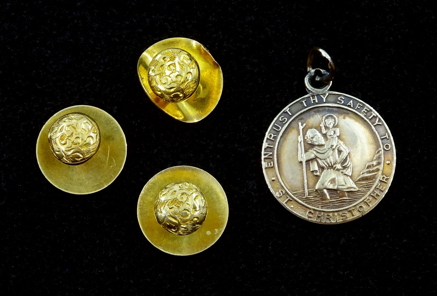 Three gold studs stamped 18ct and a St Christopher's pendant, hallmarked 9ct