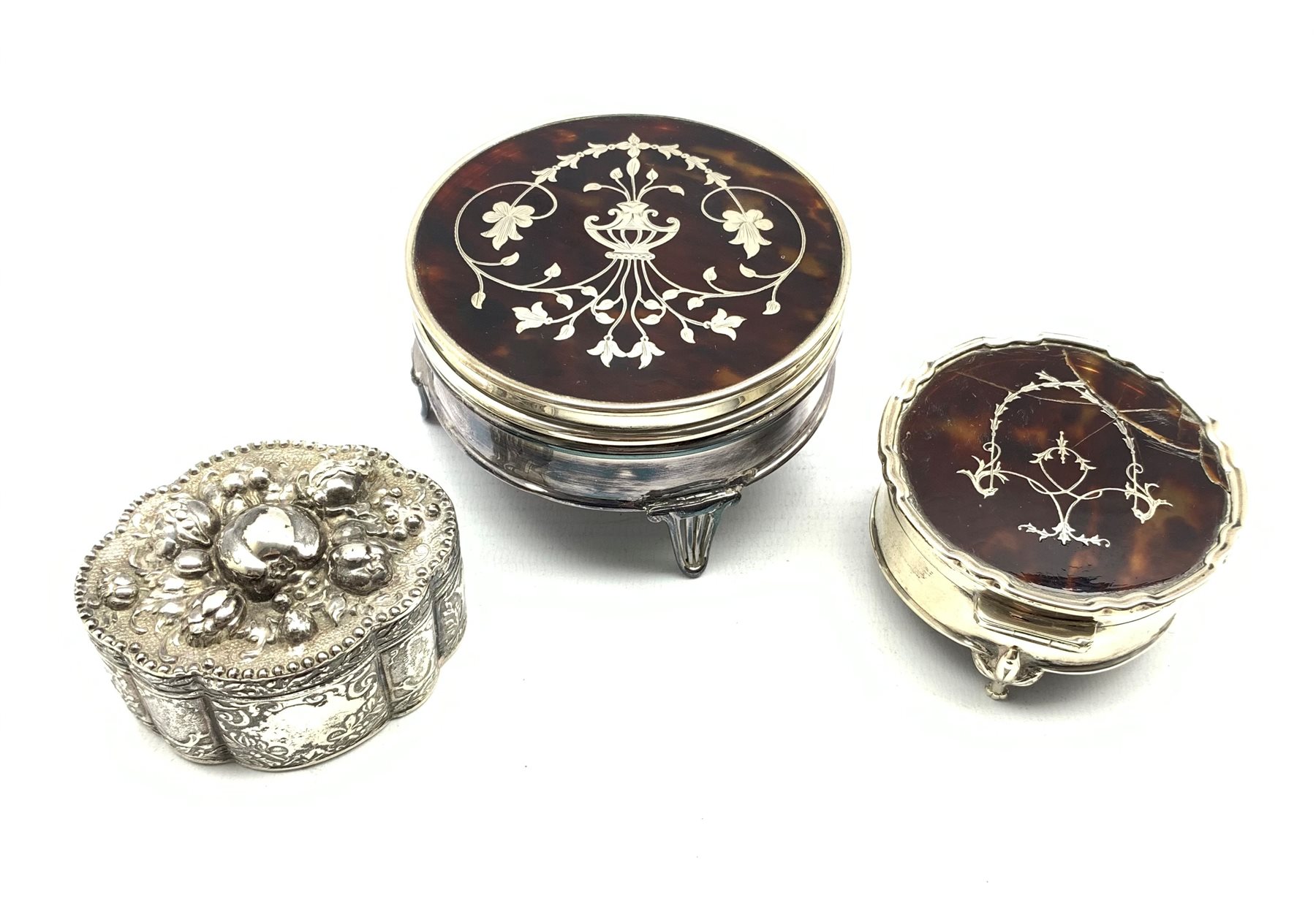 Silver circular dressing table box with pull off tortoiseshell cover and silver pique decoration D8.