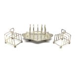 Edwardian silver four division toast rack with integral stand London 1901 Maker William Hutton and a