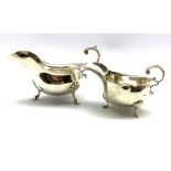 Georgian design silver sauceboat with crimped rim, leaf capped handle and triple supports Chester 19