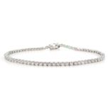 White gold diamond line bracelet, stamped 18K, total diamond weight 2.75 carat