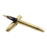 Sheaffer 9ct gold fountain pen, engine turned decoration and cartouche, with 14ct gold nib, London 1
