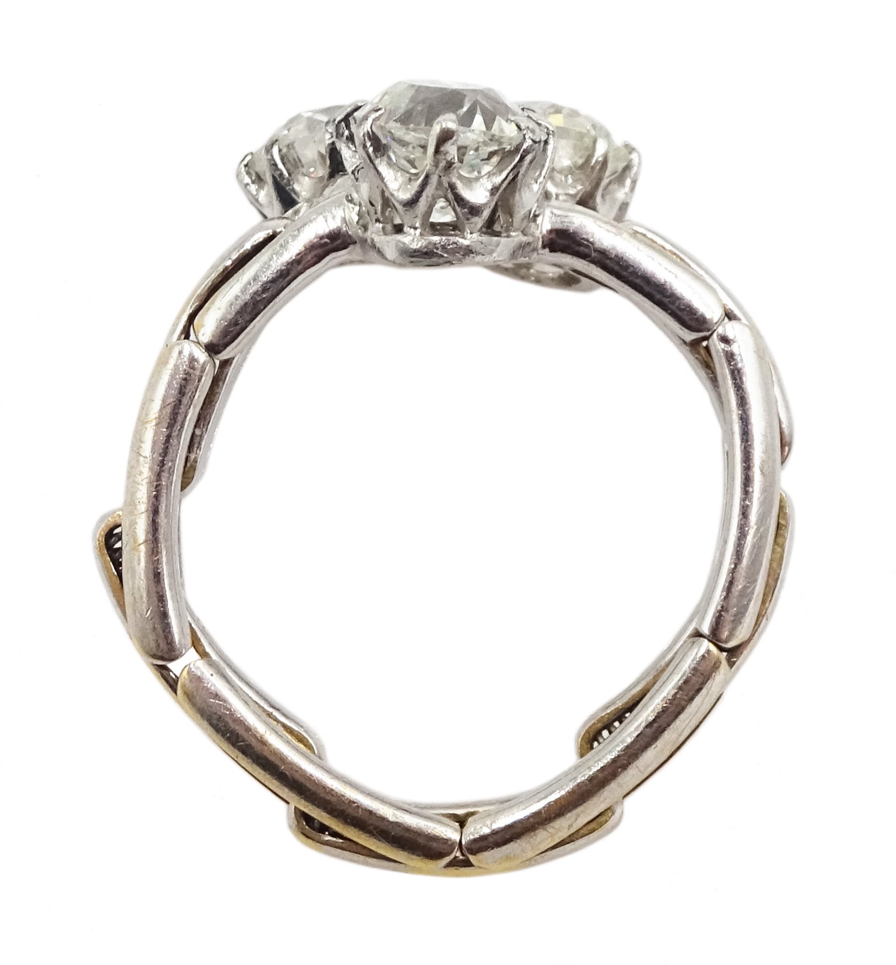 Early 20th century platinum three stone old cut diamond ring, on later 17ct white gold expanding sha - Image 4 of 4