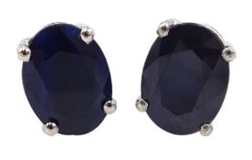 Pair of silver oval sapphire stud earrings