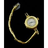Swiss 18ct gold ladies manual wind wristwatch, case by Stockwell & Co, London import marks 1921, on