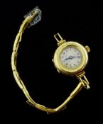 Swiss 18ct gold ladies manual wind wristwatch, case by Stockwell & Co, London import marks 1921, on