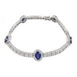 18ct white gold oval sapphire and round brilliant cut diamond link bracelet, hallmarked, total sapph