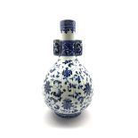 Chinese baluster vase decorated in blue and white with cylindrical handles H28cm, Daoguang mark but