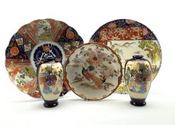Japanese Imari pattern plate decorated with panels of buildings and flowers in orange, blue etc D30c