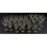 Part suite of Stuart Crystal Hardwicke pattern glasses with gilt rims, comprising ten large claret g