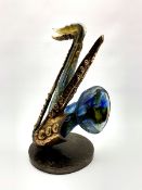 Yves Lohe (French b1947) Glass and bronze sculpture 'Grande Saxophonie' on a circular plinth, signed