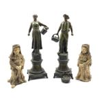 Pair of French Spelter figures after H Tremo and a pair of 19th century pottery candlesticks each mo