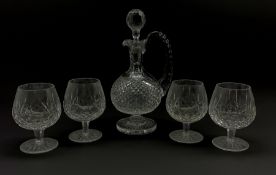 Waterford crystal claret decanter with certificate and four Waterford Crystal Lismore pattern brandy