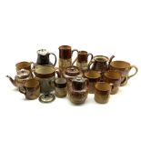 Collection of Doulton and other harvest ware including teapot with silver collar, mugs in various si