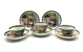 Four late 18th century porcelain tea bowls and saucers, probably Liverpool, painted in underglaze bl