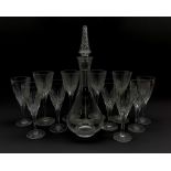 Part suite of Stuart Crystal Lichfield pattern glass comprising four large claret glasses and seven