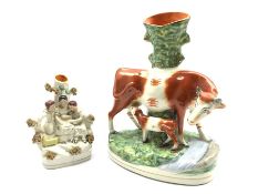 Victorian Staffordshire figural spill vase and reproduction Staffordshire type spill vase, H27cm