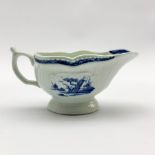 Small Worcester Fisherman and Billboard Island pattern strap fluted sauce boat, painted in blue with