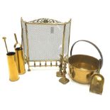 Brass and wire mesh folding spark guard, brass preserve pan D35cm, two brass shell cases, fire imple