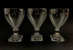Three 19th century glass rummers with lemon squeezer bases, H15cm