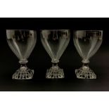 Three 19th century glass rummers with lemon squeezer bases, H15cm